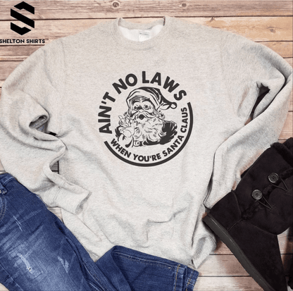 Aint No Laws When Youre Santa Claus Christmas Sweatshirt Aint No Laws When Youre Santa Claus Christmas Sweatshirt Shelton Shirts