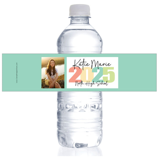 Clear water bottle with a personalized label featuring a photo and text on a white background