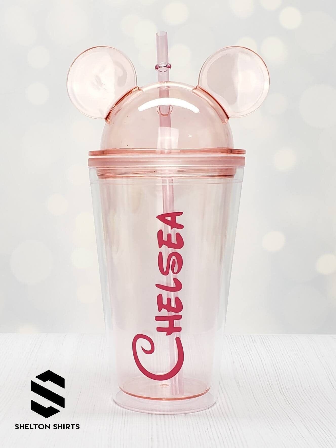 https://candywrapperstore.com/cdn/shop/products/mickey-mouse-ears-tumbler-with-personalized-name-decal-double-wall-high-grade-16-oz-acrylic-tumbler-with-colored-straw-32125473816734.jpg?v=1691003121&width=1445
